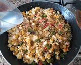 A picture of step 6 of Paella with Cuttlefish and Seasonal Vegetables.