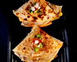 A picture of step 5 of Aloo Matar Tikki Paneer Schezwan Tortilla Quesadilla.
