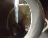 A picture of step 1 of Daliya Pulao.