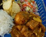 A picture of step 12 of Chicken and Egg Curry.