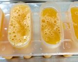 A picture of step 3 of My Mango and Orange lollies and iced Drink 😍.