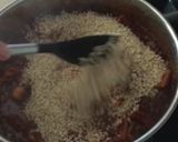 Foto del paso 9 de la receta: Arroz integral meloso con pulpo y berberechos frescos