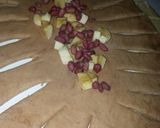 A picture of step 7 of # Baking contest.Double braided chocolate banana bread + nuts.