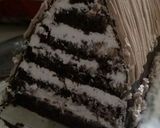 A picture of step 16 of Snow village cake.