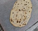 Foto del paso 6 de la receta: Coca de panadero con pepitas de chocolate y piñones