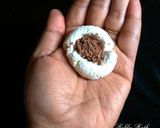 A picture of step 9 of Chocolate filled rasgulla in chilled custard.