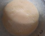 A picture of step 2 of Orange Lassi.