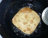 A picture of step 4 of Madakku pathiri(folded roti).