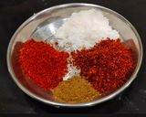 A picture of step 1 of Sindhi Style Brown Rice/Bhugga Chawal.