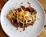 Foto del paso 11 de la receta: Presa ibérica en salsa de Oporto con patatas paja