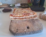 Foto del paso 9 de la receta: Pizza crocante con queso muzzarella y un toque de panceta