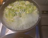 Une image de l'étape 2 de Saumon accompagné de riz courgettes grillées et fondu de poireau.