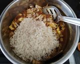 A picture of step 6 of Mushroom potato biryani.