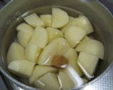 A picture of step 1 of Bouillon Cheese Potatoes.