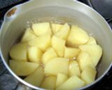 A picture of step 2 of Bouillon Cheese Potatoes.