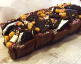 A picture of step 11 of Easy No-Bake Oreo Chocolate Cake.