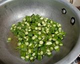 A picture of step 1 of Soak fry aaloo bhindi.