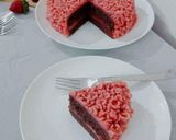 A picture of step 18 of Eggless Chocolate cake with Strawberry Buttercream frosting.