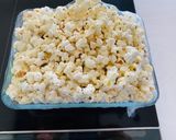 A picture of step 3 of Low-Calorie Microwave Popcorn.