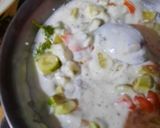 A picture of step 4 of Cucumber raita.