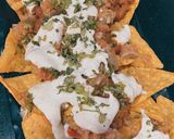 A picture of step 22 of Cheesy nachos platter😋😋❤️.