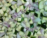 Une image de l'étape 2 de Gratin de poulet, riz et courgette.