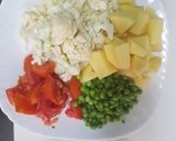 A picture of step 1 of Potatoes, Cauliflower & Peas.