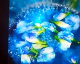 A picture of step 1 of Butterfly pea tea shots.