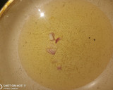 A picture of step 1 of Fried yam with source.