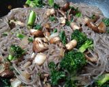 A picture of step 3 of Garlic Mushroom, Kale & Broccoli w/Purple Sweet Potato noodles.
