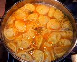 A picture of step 13 of Mike's Steamy Asian Chicken & Dumpling Soup.