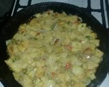Foto del paso 4 de la receta: Tortilla de papa rellena de jamón y queso