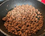 A picture of step 7 of Beef and Black Bean Crunch Burritos.