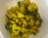 A picture of step 5 of Braised Potatoes with Spinach.