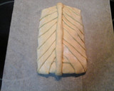 Foto del paso 6 de la receta: Trenza de hojaldre con fritada y langostinos 