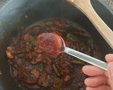 Foto del paso 4 de la receta: Arroz caldoso con conejo y setas