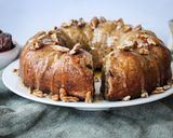 A picture of step 5 of Spiced Pecan nut and Date pudding in a bundt.