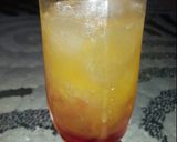 A picture of step 1 of Sunrise mocktail nd Blue layered paradise.