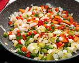 Foto del paso 3 de la receta: Costillas de cerdo desmenuzadas, con verduras