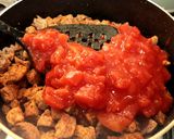 A picture of step 3 of Pork in tomatoes 🍅.