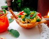 A picture of step 6 of Crispy Edible Diyas filled with Pasta Chat.