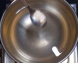 A picture of step 1 of Corn cheese pasta in peri peri white sauce.