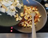 A picture of step 3 of Madurai egg kari dosa.