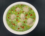 A picture of step 8 of Jade Egg Drop Soup with Soup Dumplings.