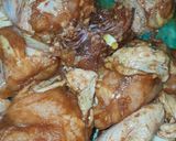 A picture of step 2 of Chicken garnished with butter and garlic😋.