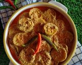 A picture of step 8 of Tilottoma_Kakrol (spiny gourd curry).