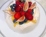 A picture of step 3 of Pavlova with berries and lemon curd.