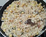 A picture of step 2 of Aloo chana deghi pulao.