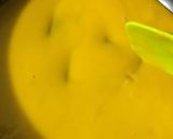 A picture of step 2 of Mango flavoured milk cake in two layers.