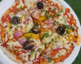 A picture of step 6 of Pizza uttapam.